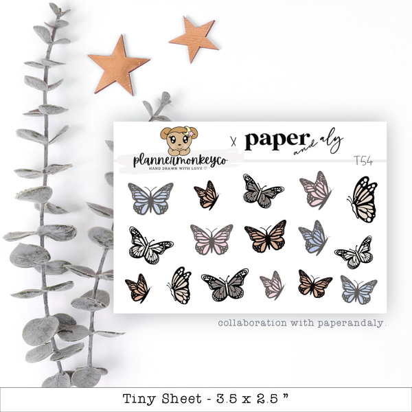a sheet of paper with a bunch of butterflies on it