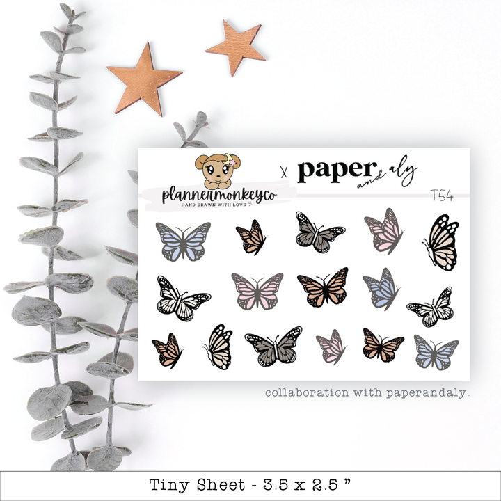 a sheet of paper with a bunch of butterflies on it