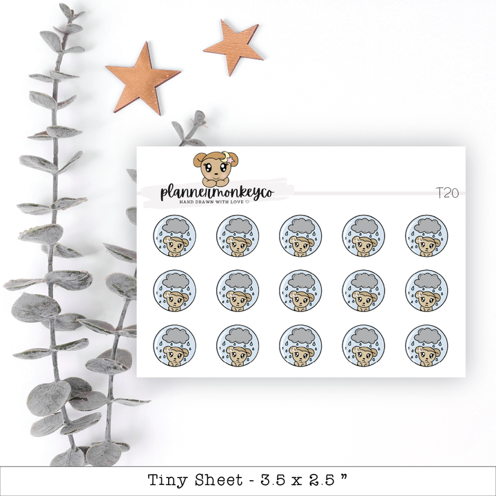 a sheet of stickers with a teddy bear on it