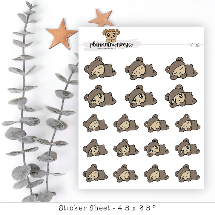 a sheet of stickers with a teddy bear on it