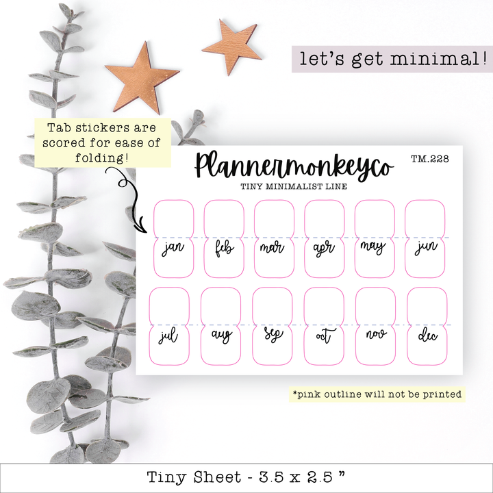 a planner sticker with a plant next to it