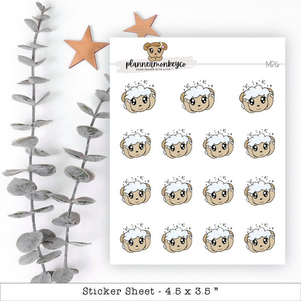 a sheet of stickers with sheep faces and stars