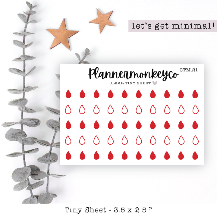 a sheet of paper with red hearts and stars on it