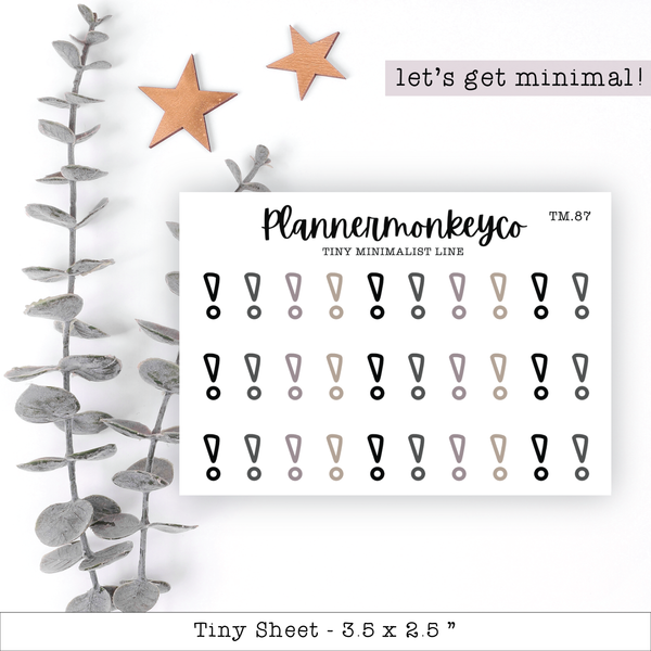 a planner sticker next to a plant