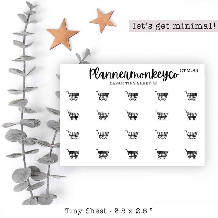 a planner sticker with a shopping cart and stars