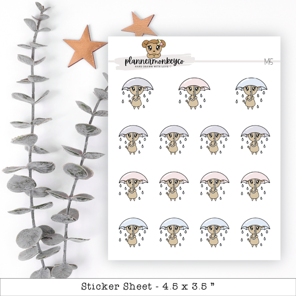 a sticker sheet with a picture of a bear holding an umbrella