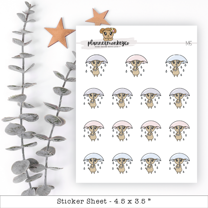 a sticker sheet with a picture of a bear holding an umbrella
