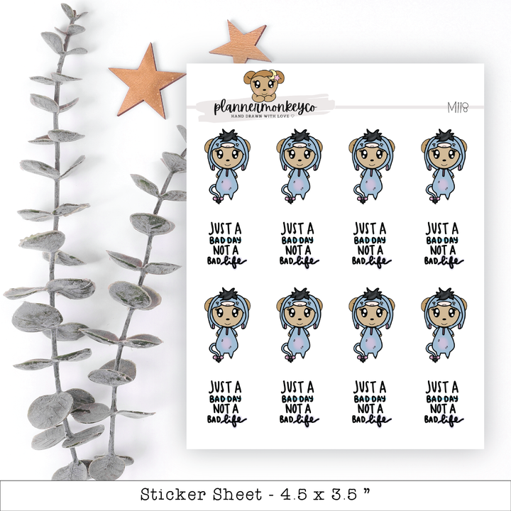 a sheet of stickers with a picture of a monkey