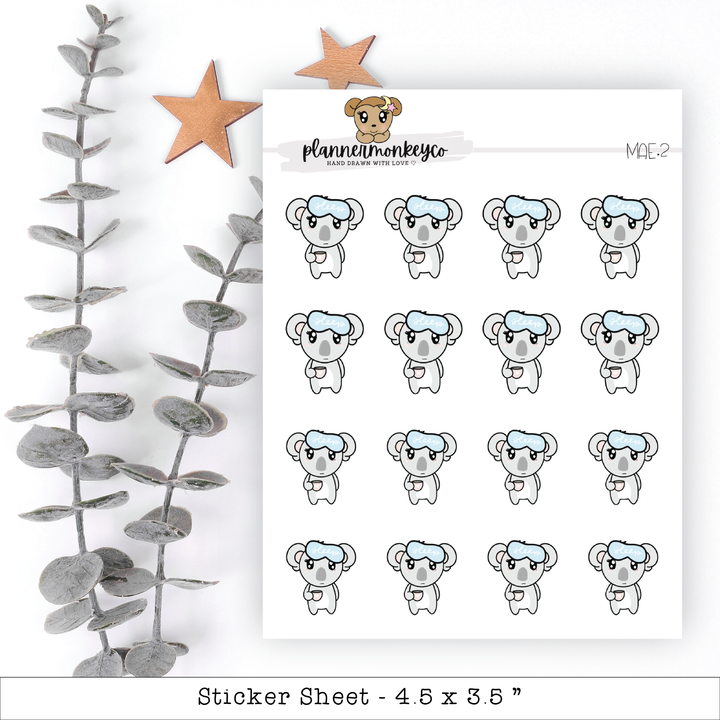 a sheet of stickers with a koala face
