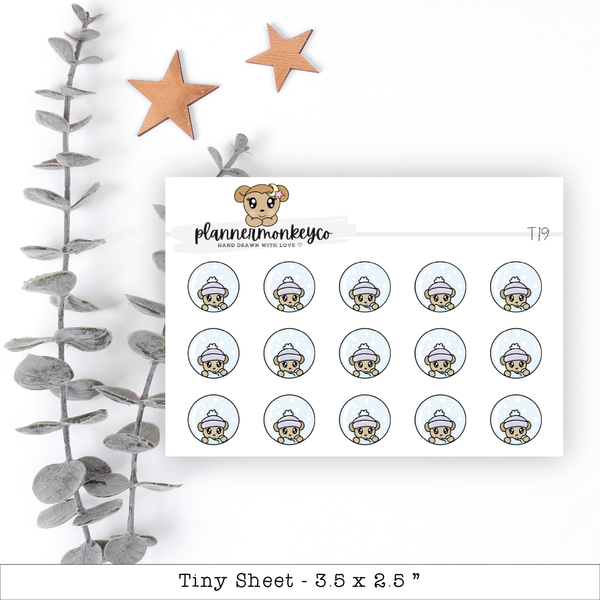 a sheet of stickers with a teddy bear on it