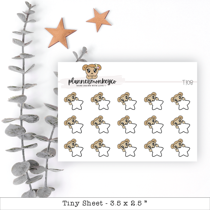 a sheet of stickers with a teddy bear on it