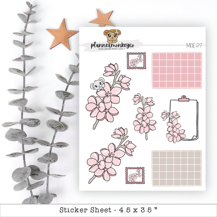a sticker sheet with flowers and a teddy bear