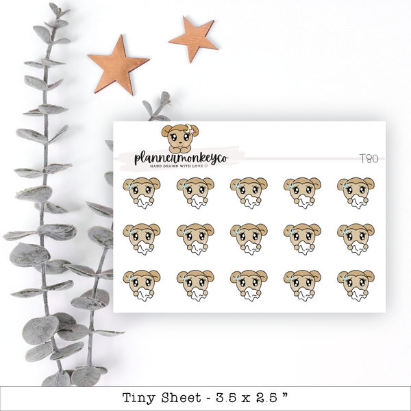 a sheet of stickers with a picture of a bear