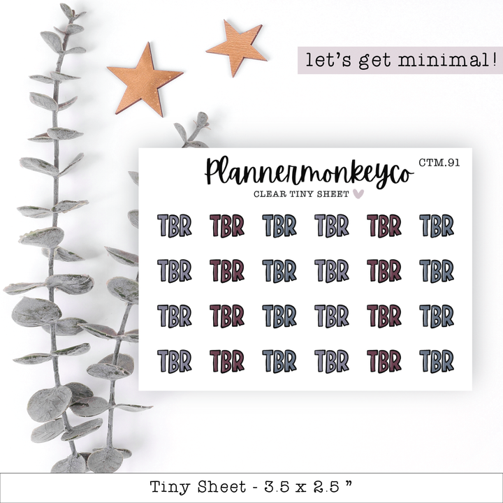 a sheet of stickers with a plant and two stars