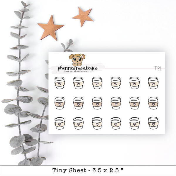 a planner sticker with coffee cups and a teddy bear
