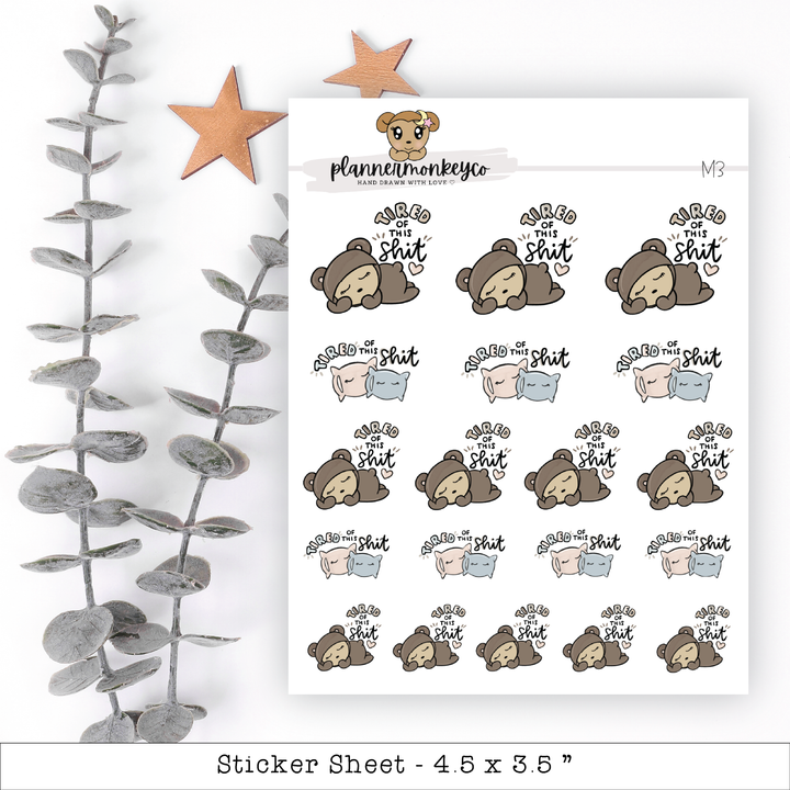 a sticker sheet with a bear and stars on it