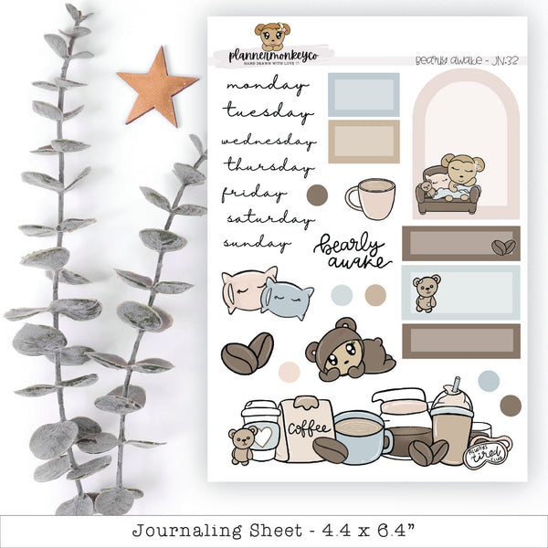 a sticker sheet with a teddy bear and baby items