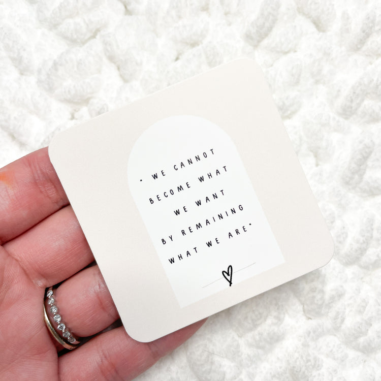 " We cannot become what we want by remaining what we are " Die Cut | CARDSTOCK